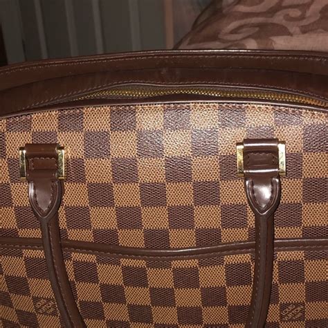 dillard's pre owned louis vuitton.